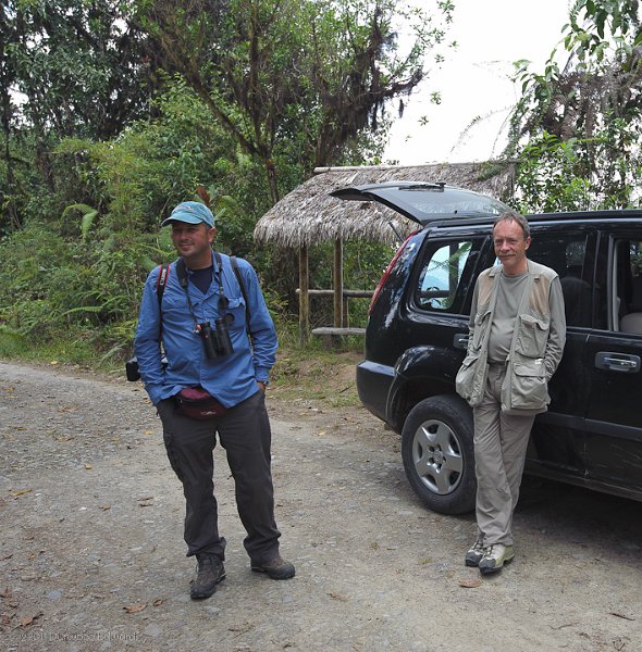 SamandJeanLuc-1010.jpg - Sam Woods, our guide, and Jean-Luc take a break along the Upper Tandayapa. We were searching for a reported Toucan nest, but had stopped here so I could shoot a panorama from the sheltered overloook seen in the background.