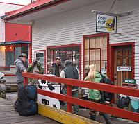  The group (Charlie, Dave, Brad, Matt, Pam, JoAnne) assembles in front of the B&B  to leave for seaplane port.
