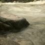 Yosemite Creek <br>That is a piece of ice on top of the 4 foot diameter boulder.